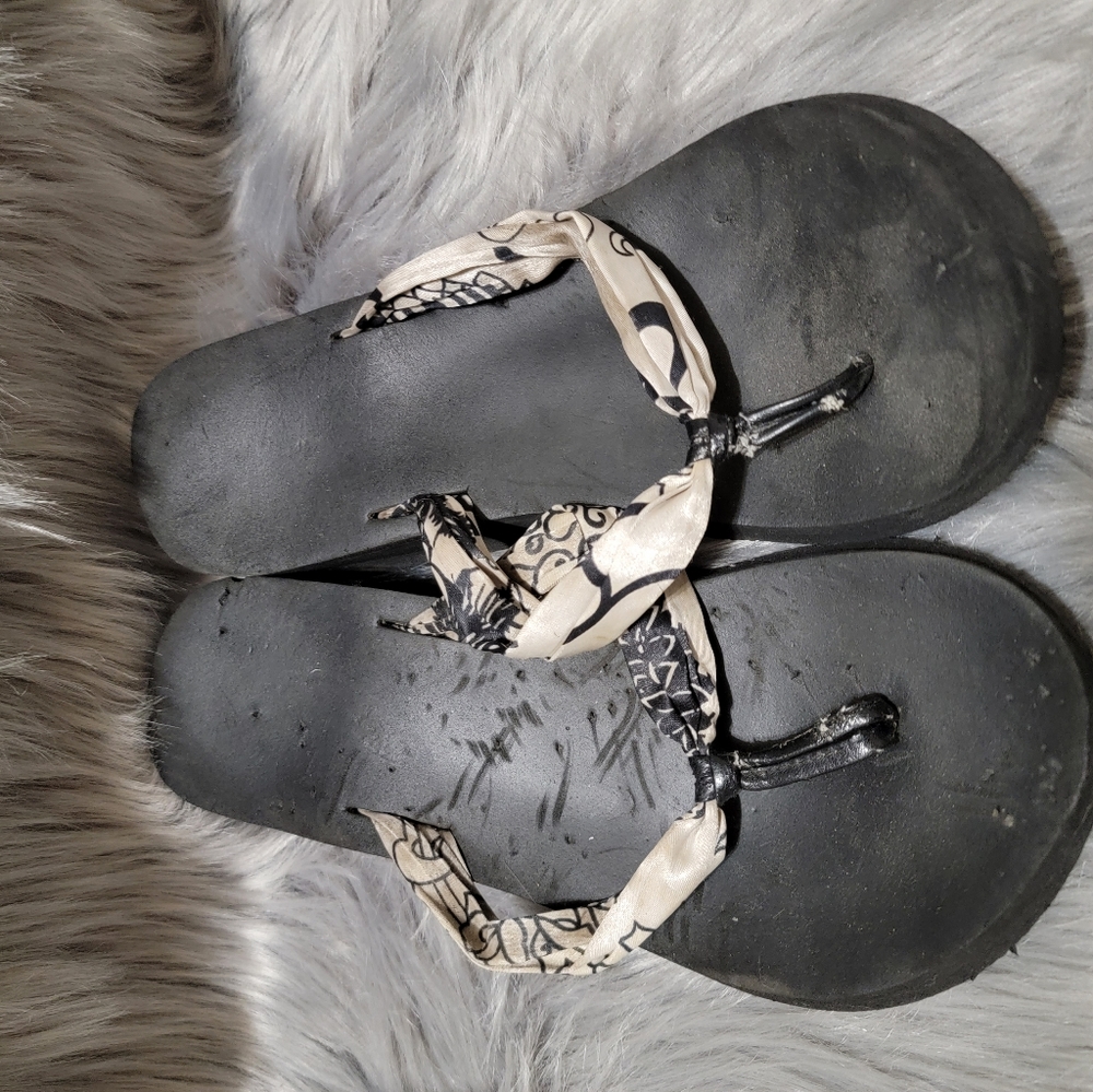 Worn woman's sandals